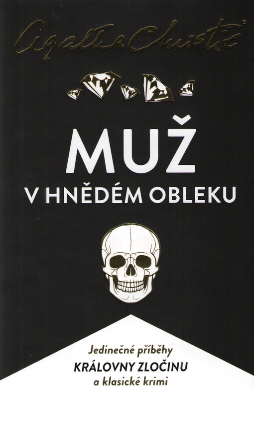 Muž v hnědém obleku