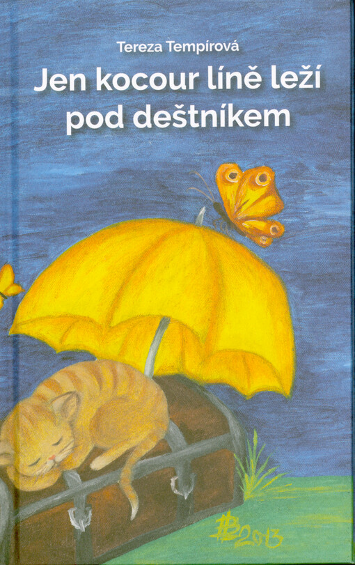Jen kocour líně leží pod deštníkem